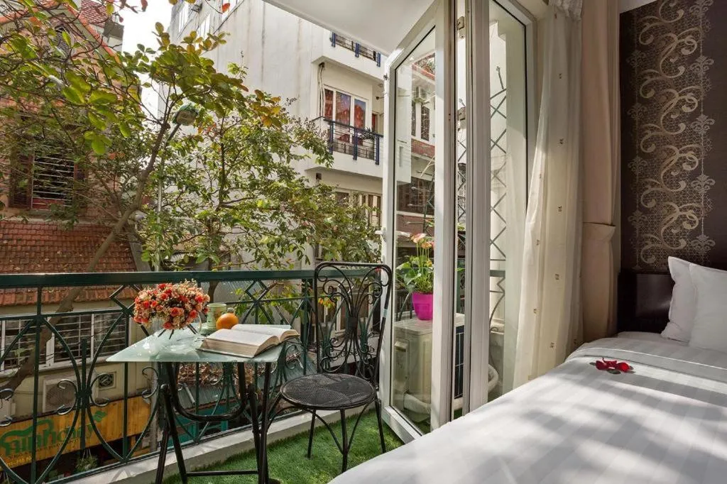 Bed in Hanoi Impressive Hotel