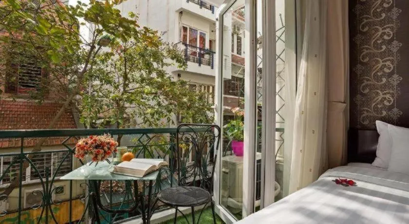 Bed in Hanoi Impressive Hotel