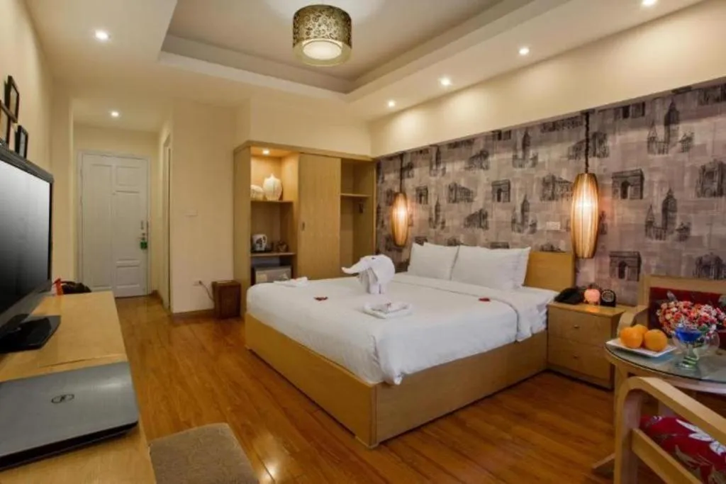 Bed in Hanoi Impressive Hotel