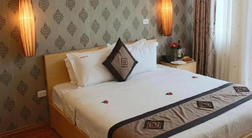 Bed in Hanoi Impressive Hotel