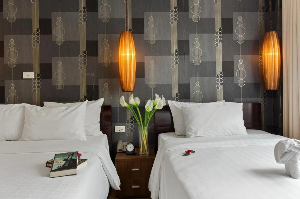 Bed in Hanoi Impressive Hotel