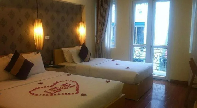 Bed in Hanoi Impressive Hotel
