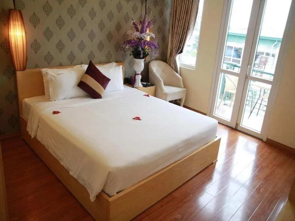 Bed in Hanoi Impressive Hotel