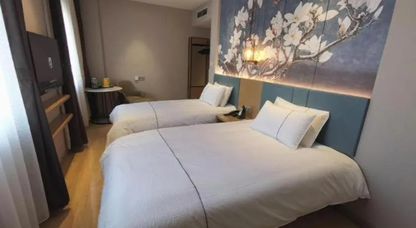 Bed in Jinjiang Inn Tianjin Station Jinwan Square