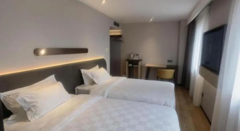 Bed in Jinjiang Inn Tianjin Station Jinwan Square