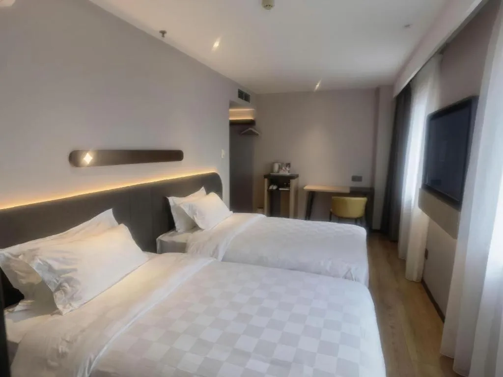 Bed in Jinjiang Inn Tianjin Station Jinwan Square