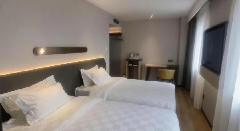 Bed in Jinjiang Inn Tianjin Station Jinwan Square