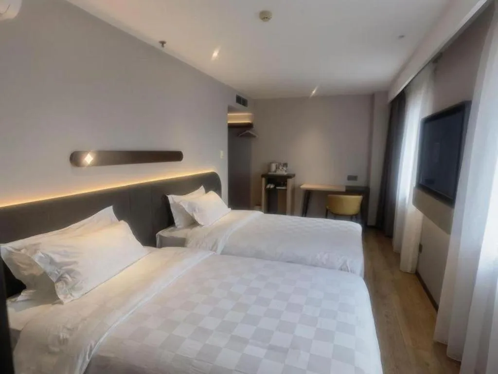 Bed in Jinjiang Inn Tianjin Station Jinwan Square