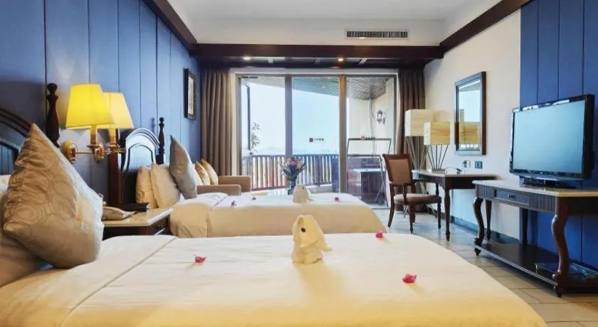 Bed in Timton Fuhe Hotel Sanya