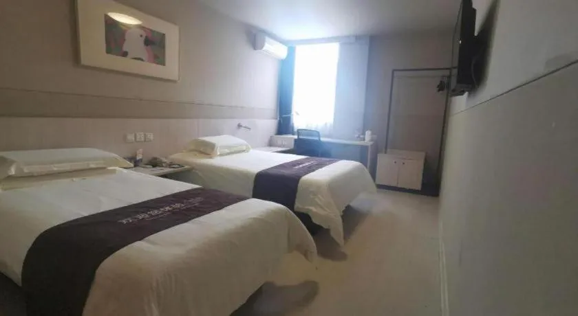 Bed in Jinjiang Inn Wuhan Hanjiang Road Metro Station Jiangtan Pedestrian Street