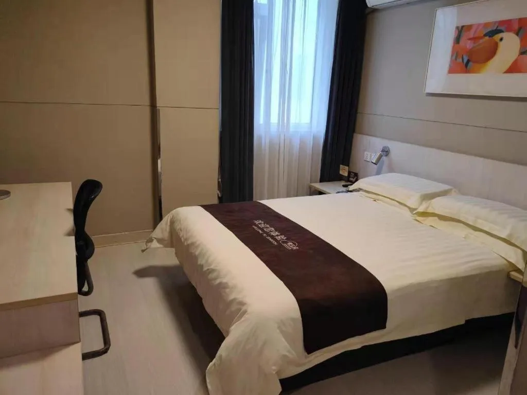 Bed in Jinjiang Inn Wuhan Hanjiang Road Metro Station Jiangtan Pedestrian Street