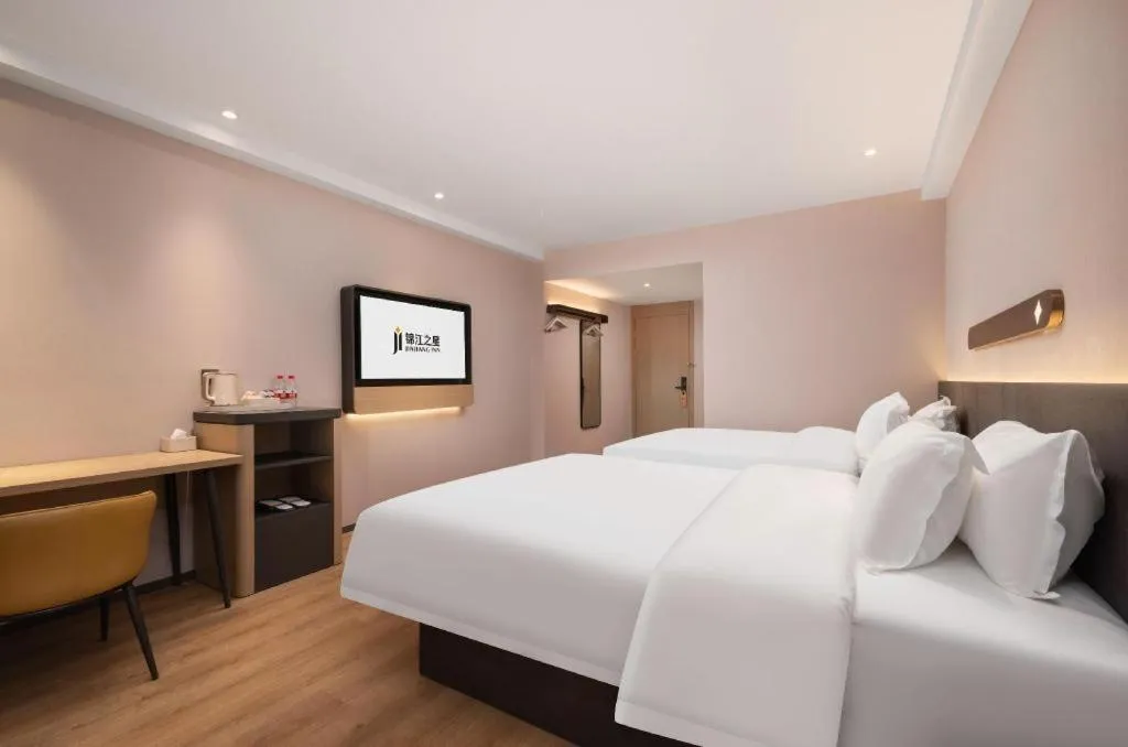 Bed in Jinjiang Inn Wuhan Hanjiang Road Metro Station Jiangtan Pedestrian Street
