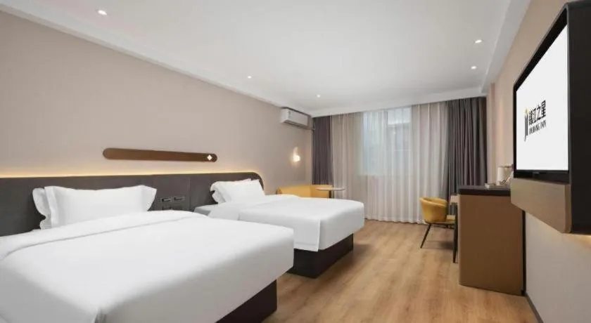 Bed in Jinjiang Inn Wuhan Hanjiang Road Metro Station Jiangtan Pedestrian Street