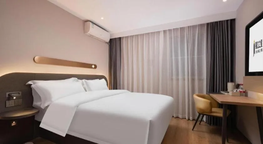 Bed in Jinjiang Inn Wuhan Hanjiang Road Metro Station Jiangtan Pedestrian Street