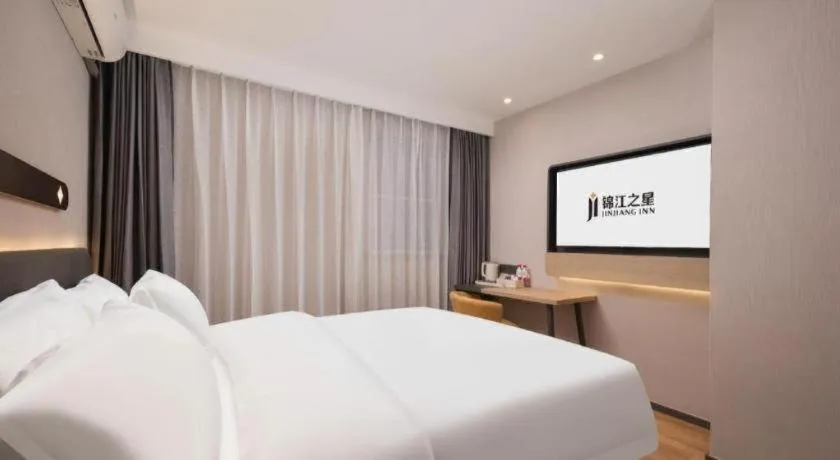 Bed in Jinjiang Inn Wuhan Hanjiang Road Metro Station Jiangtan Pedestrian Street