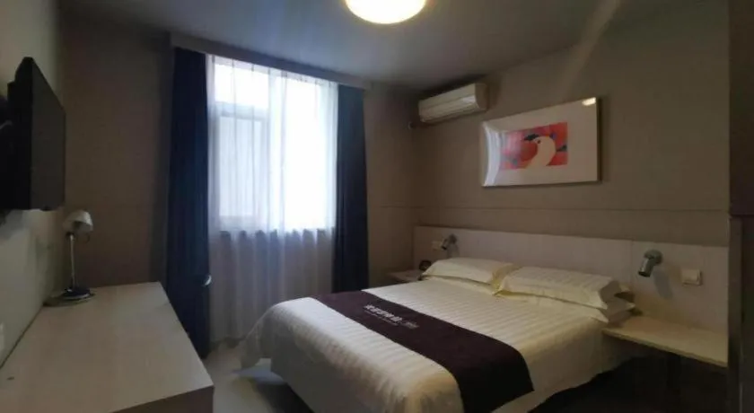 Bed in Jinjiang Inn Wuhan Hanjiang Road Metro Station Jiangtan Pedestrian Street