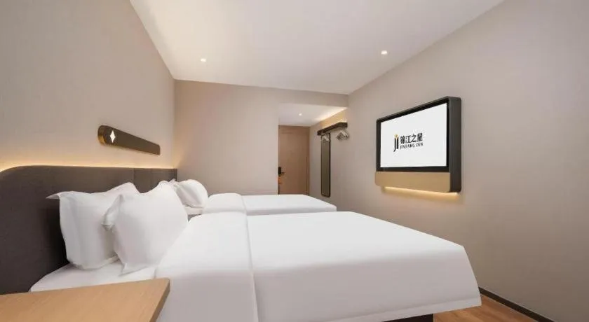 Bed in Jinjiang Inn Wuhan Hanjiang Road Metro Station Jiangtan Pedestrian Street
