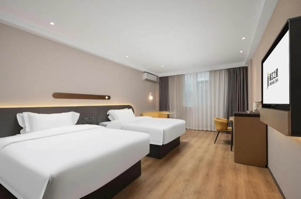 Bed in Jinjiang Inn Wuhan Hanjiang Road Metro Station Jiangtan Pedestrian Street