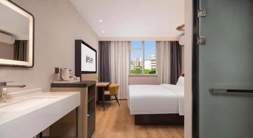 Bed in Jinjiang Inn Wuhan Hanjiang Road Metro Station Jiangtan Pedestrian Street