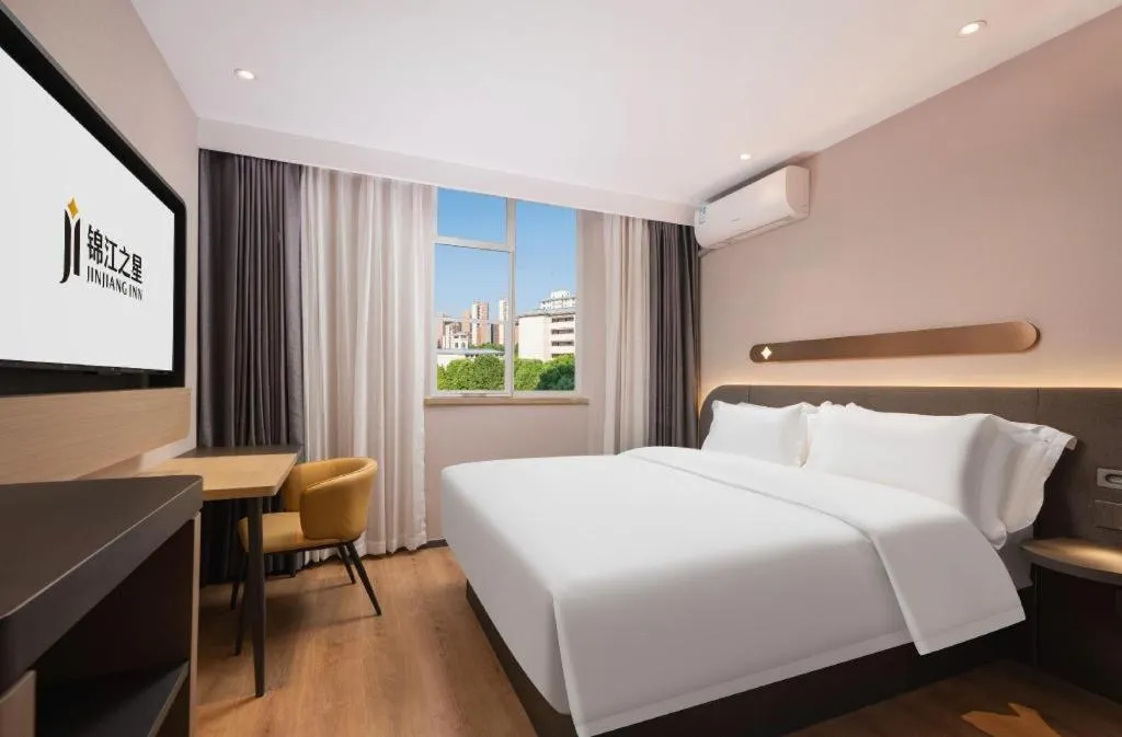 Bed in Jinjiang Inn Wuhan Hanjiang Road Metro Station Jiangtan Pedestrian Street