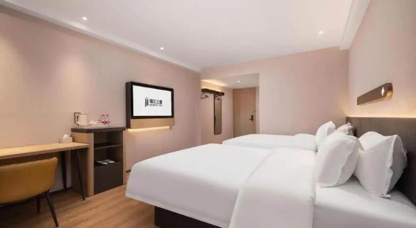 Bed in Jinjiang Inn Wuhan Hanjiang Road Metro Station Jiangtan Pedestrian Street
