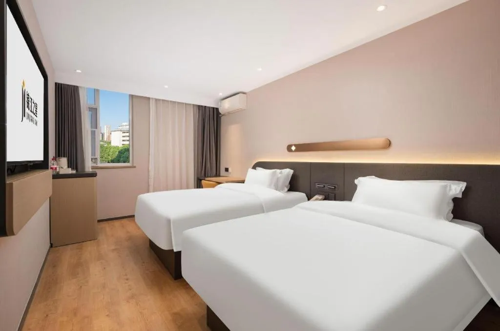 Bed in Jinjiang Inn Wuhan Hanjiang Road Metro Station Jiangtan Pedestrian Street