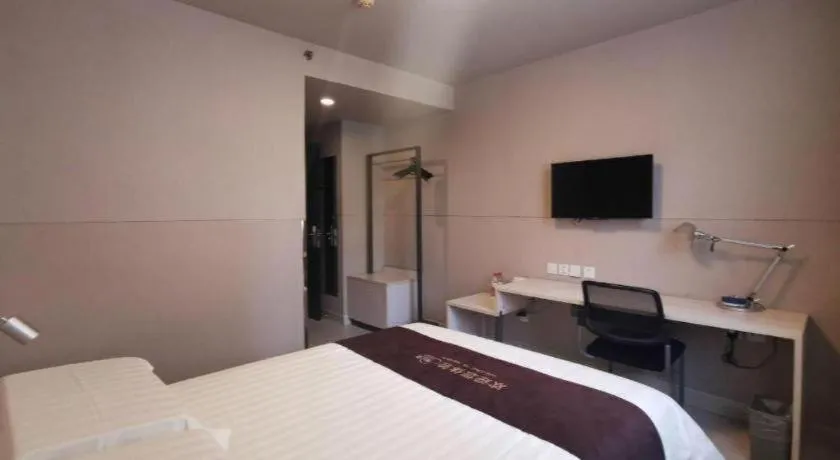 Bed in Jinjiang Inn Wuhan Hanjiang Road Metro Station Jiangtan Pedestrian Street