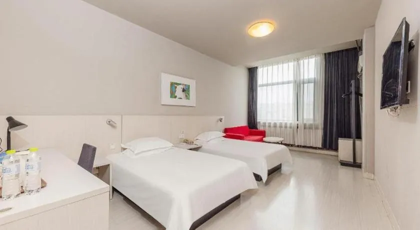 Bed in Jinjiang Inn JiNan Daminghu New Scenic Area Lishan Road