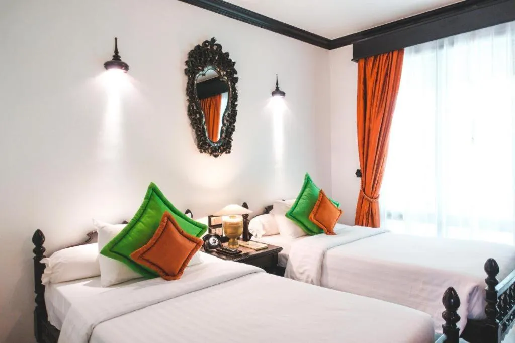 Bed in Angkor Village Resort & Spa
