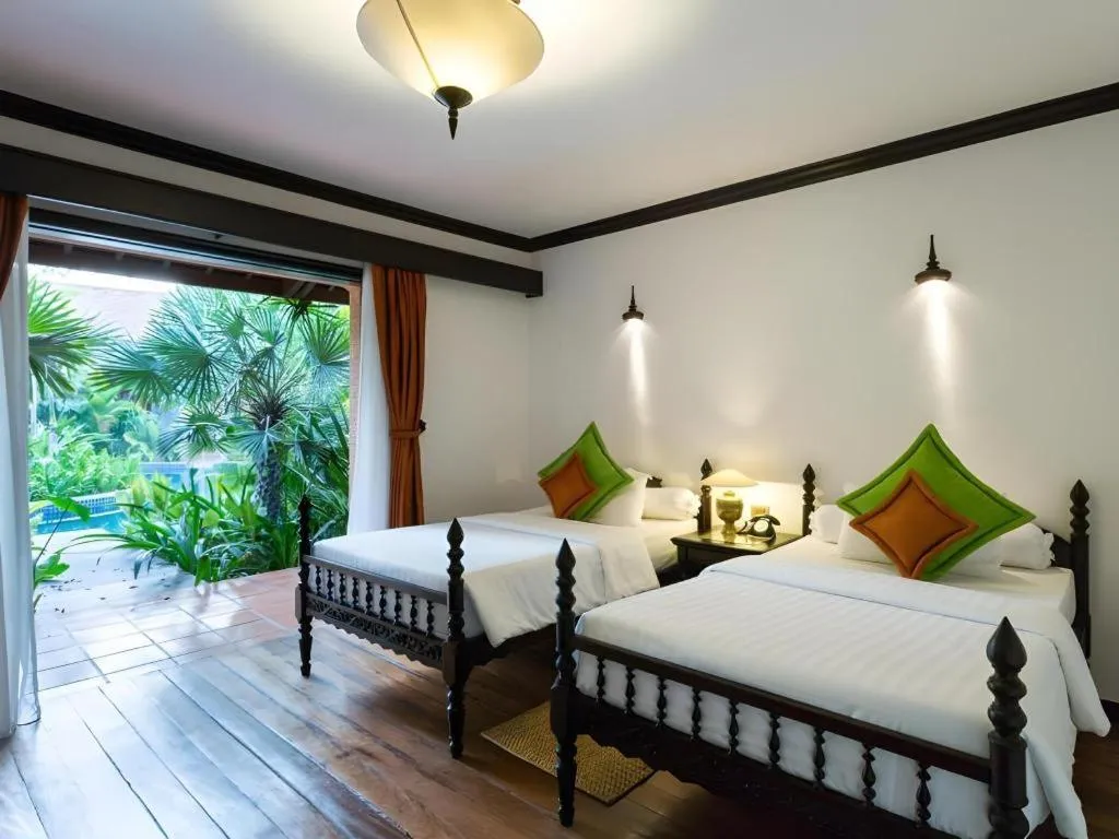 Bed in Angkor Village Resort & Spa