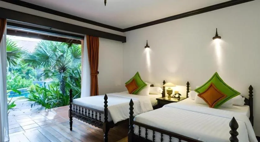 Bed in Angkor Village Resort & Spa