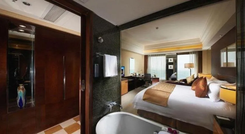 Bed in New Century Hangzhou Grand Hotel