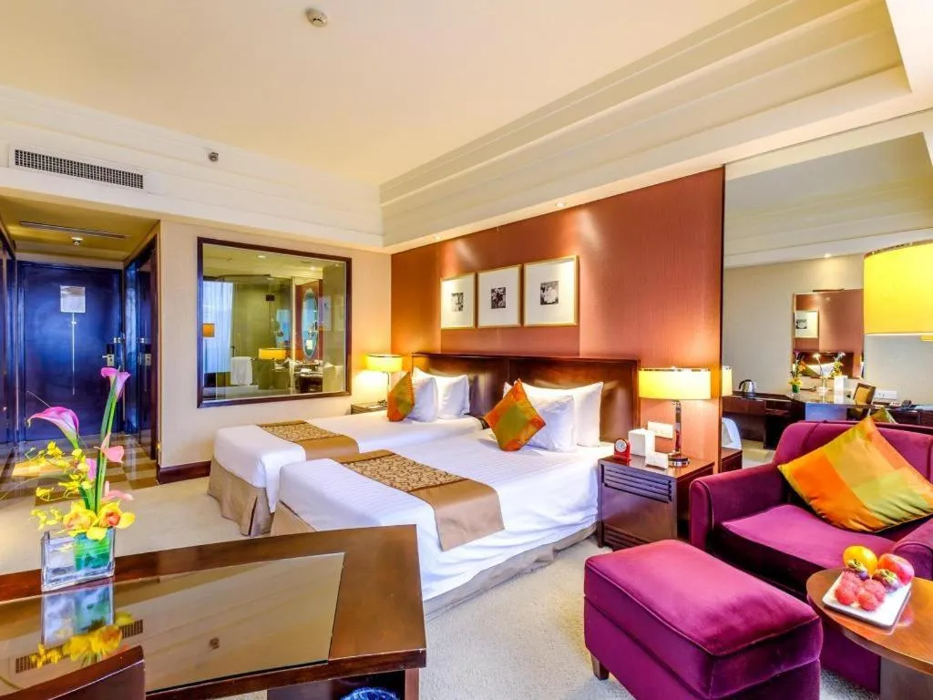 Bed in New Century Hangzhou Grand Hotel