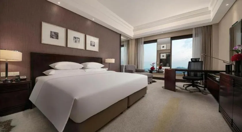 Bed in New Century Hangzhou Grand Hotel