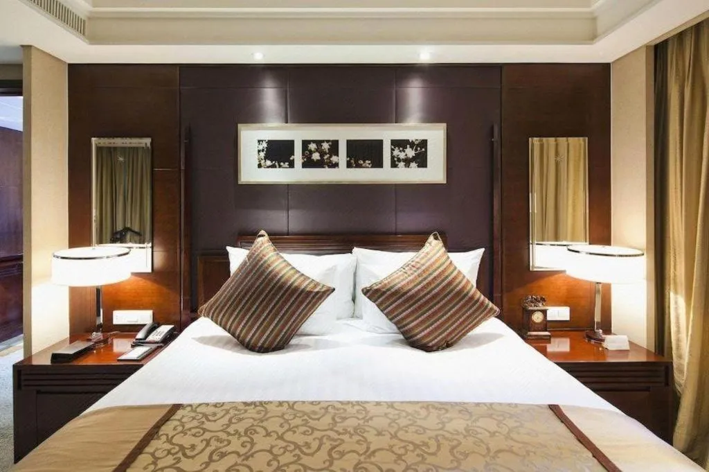 Bed in New Century Hangzhou Grand Hotel