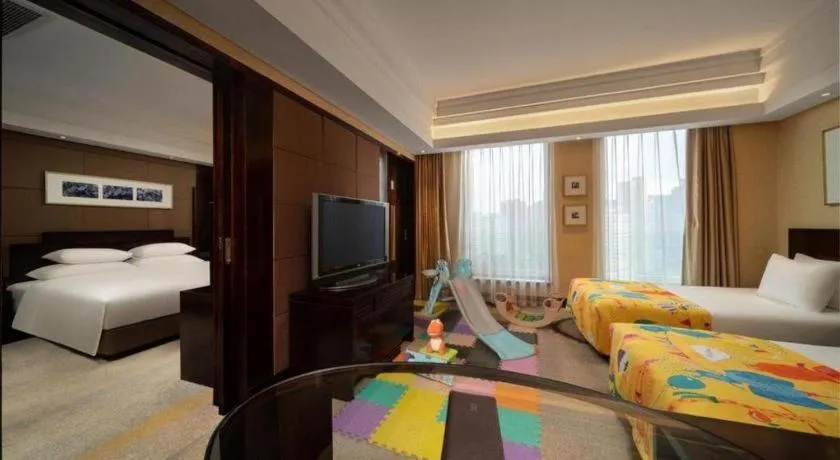 Bed in New Century Hangzhou Grand Hotel