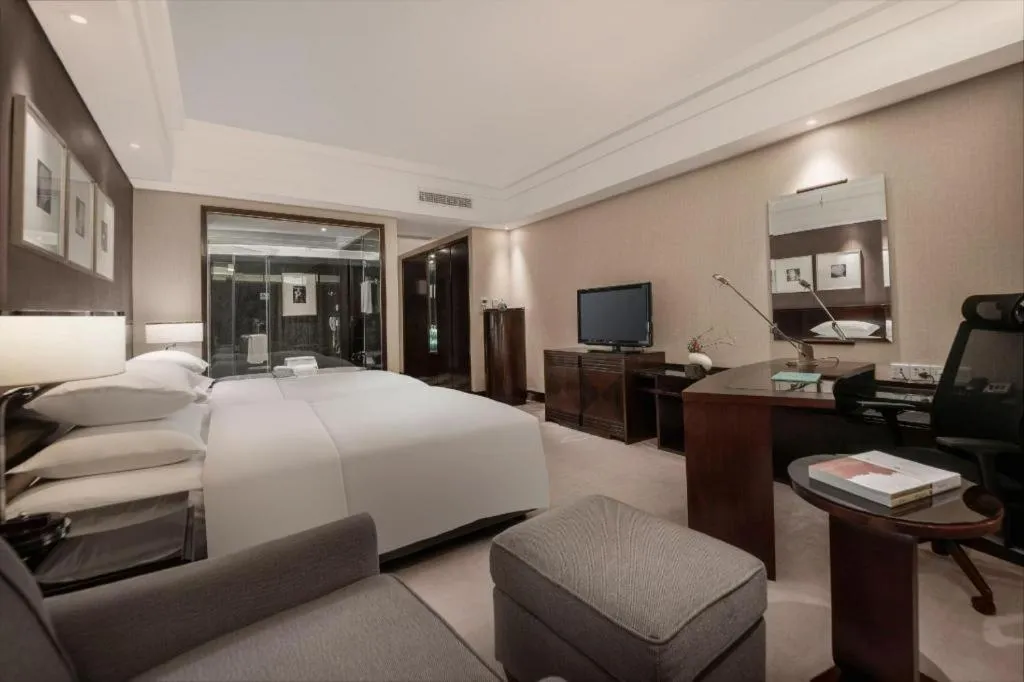 Bed in New Century Hangzhou Grand Hotel