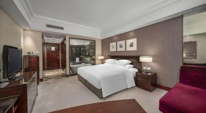 Bed in New Century Hangzhou Grand Hotel