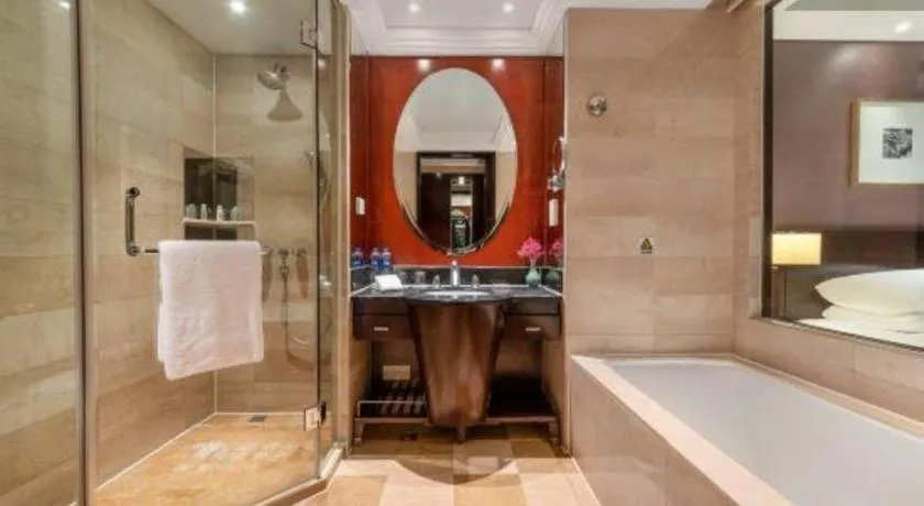 Bed in New Century Hangzhou Grand Hotel