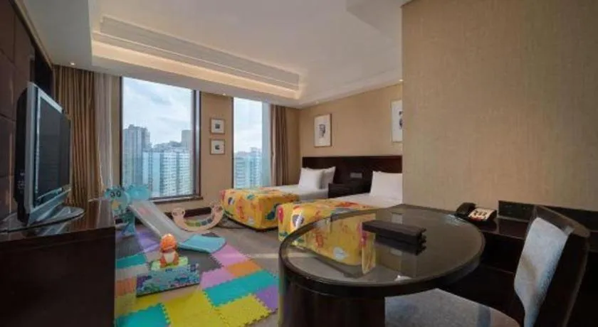 Bed in New Century Hangzhou Grand Hotel