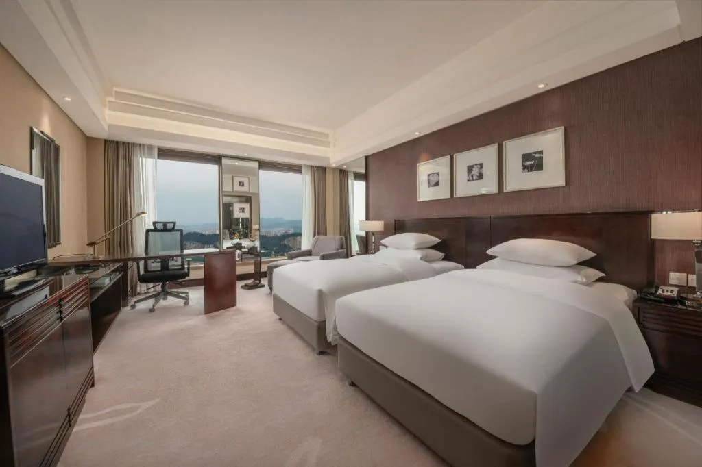 Bed in New Century Hangzhou Grand Hotel