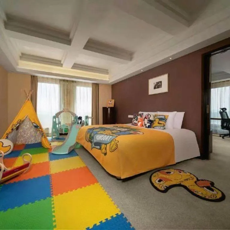 Bed in New Century Hangzhou Grand Hotel