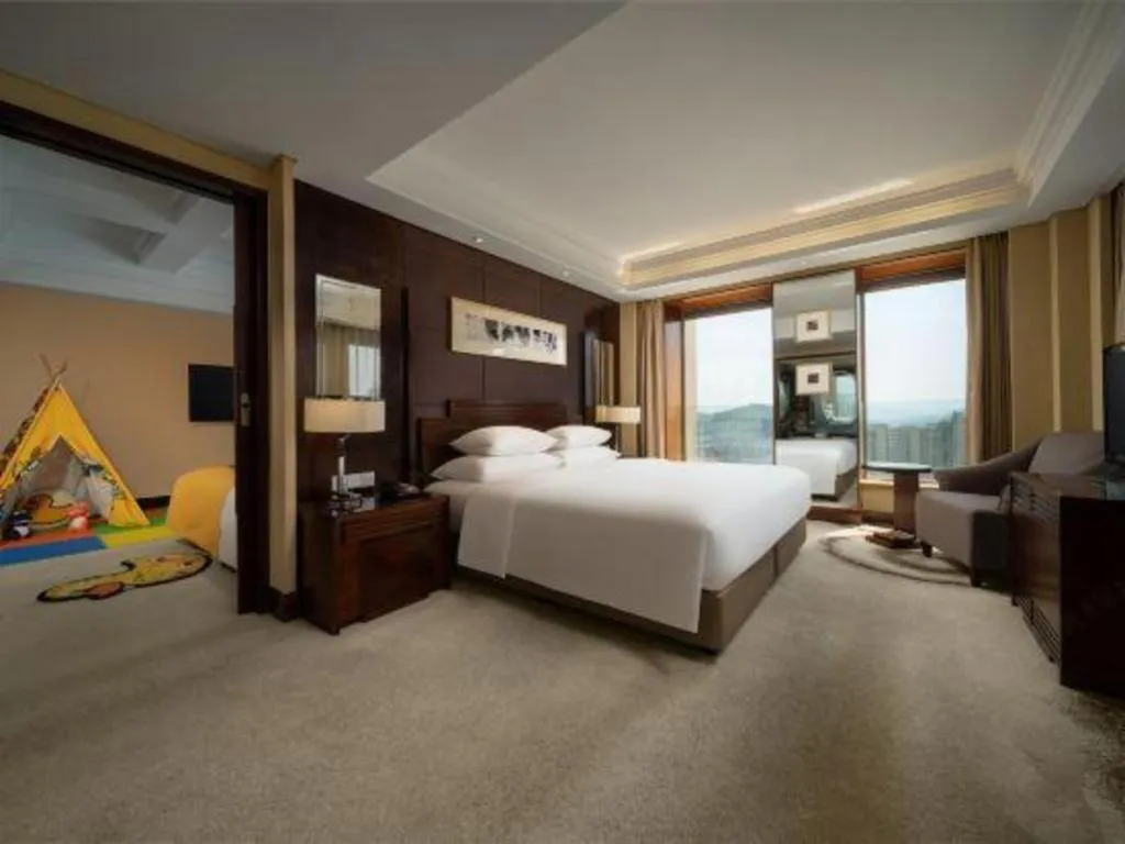 Bed in New Century Hangzhou Grand Hotel
