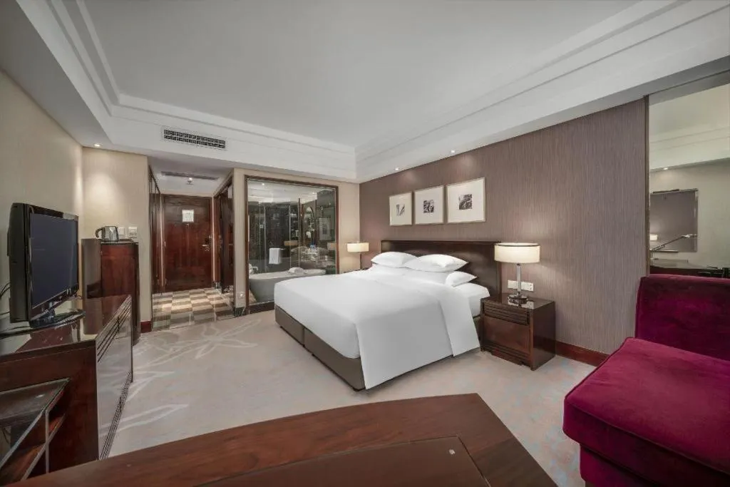 Bed in New Century Hangzhou Grand Hotel