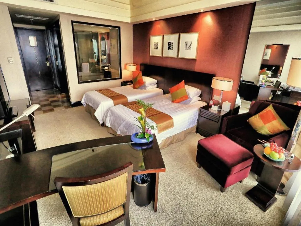 Bed in New Century Hangzhou Grand Hotel