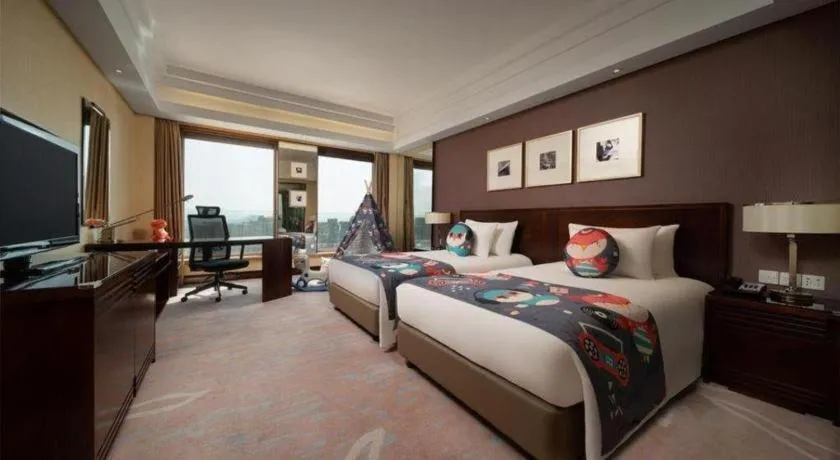 Bed in New Century Hangzhou Grand Hotel