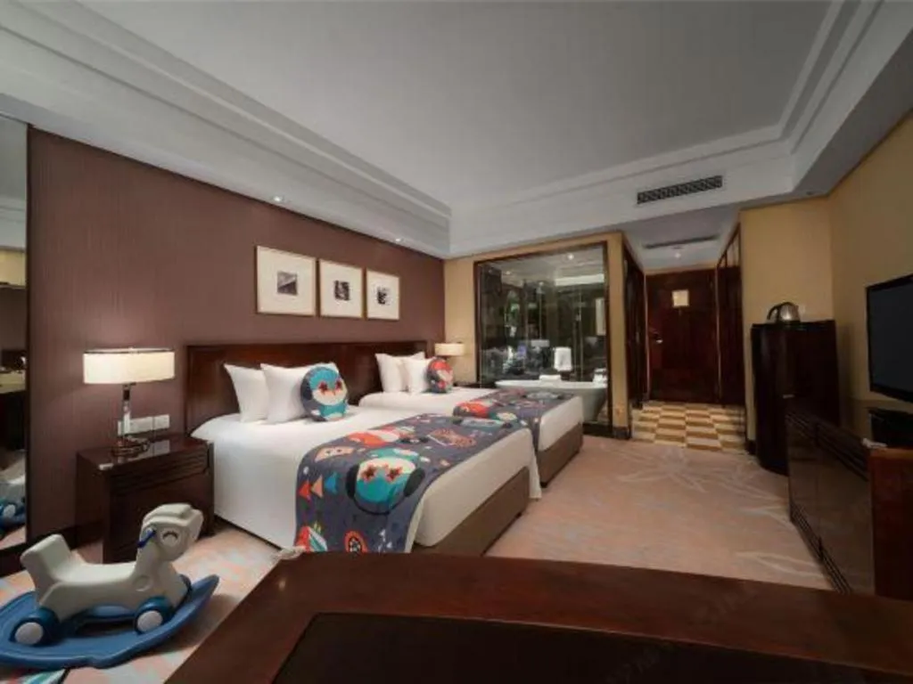 Bed in New Century Hangzhou Grand Hotel