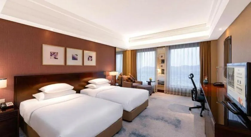 Bed in New Century Hangzhou Grand Hotel
