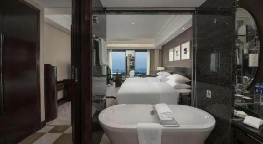 Bed in New Century Hangzhou Grand Hotel