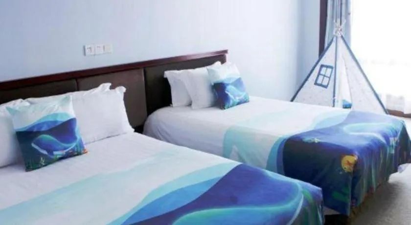 Bed in New Century Hotel Ninghai